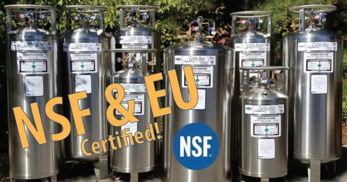 Certified nitrogen tanks labeled with NSF and FDA symbols outdoors.